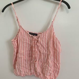 Pink tank top with white stripes